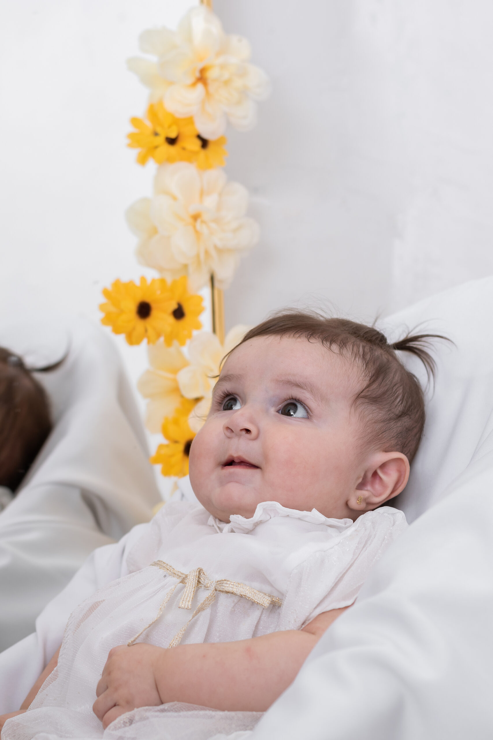 beautiful-latin-baby-girl-very-happy-looking-at-h-2025-03-10-06-49-15-utc