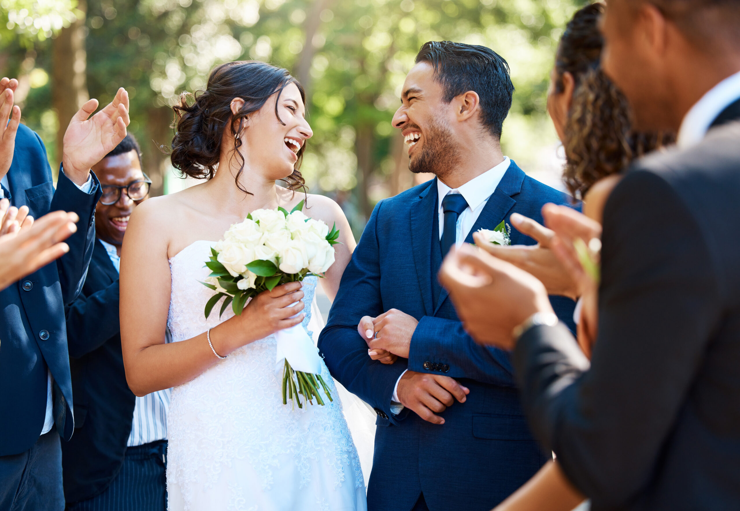 happy-bride-and-groom-laughing-and-looking-joyful-2025-04-06-07-53-40-utc